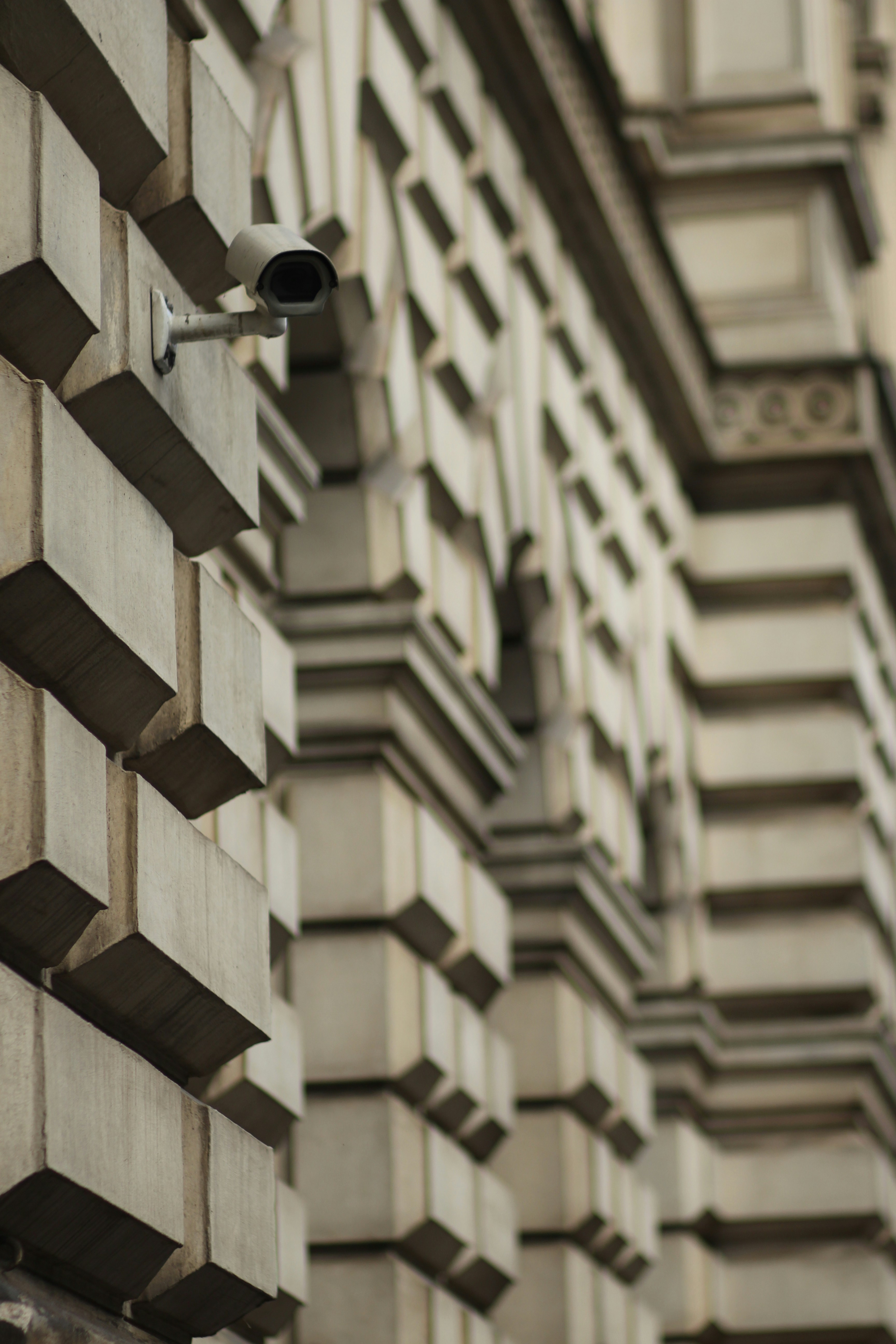 Security camera professionally installed on building exterior